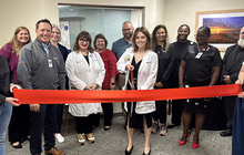 Kalee Woody ribbon cutting